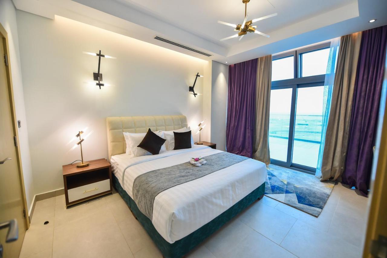 Waterfront Hotel Apartment Lusail Eksteriør bilde A bedroom at the hotel