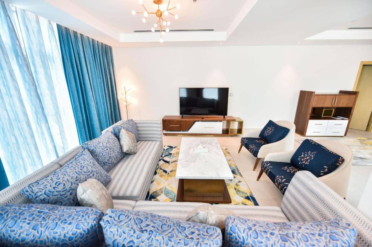 Waterfront Hotel Apartment Lusail Eksteriør bilde A living room in a luxury apartment