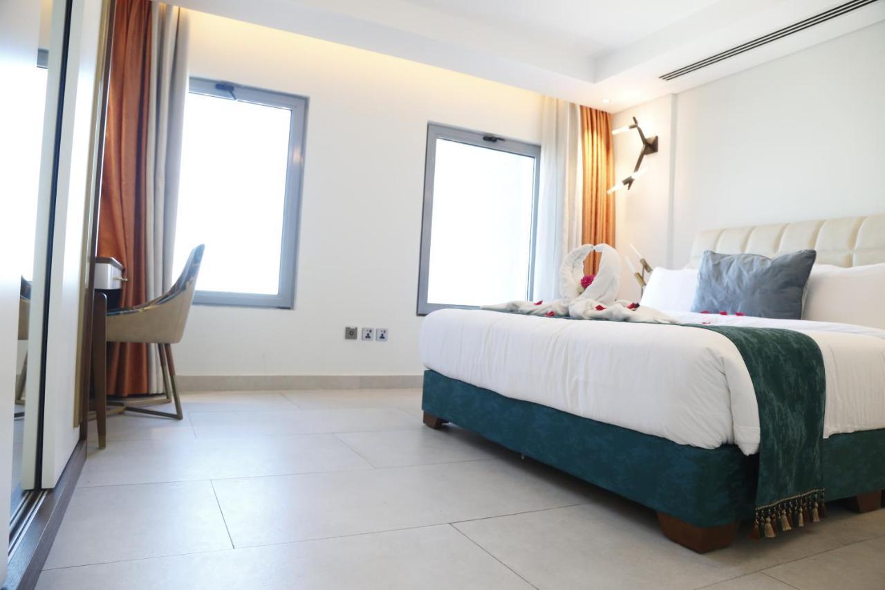 Waterfront Hotel Apartment Lusail Eksteriør bilde A room at the hotel