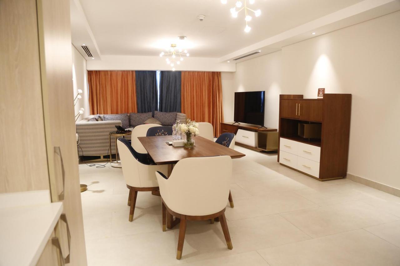 Waterfront Hotel Apartment Lusail Eksteriør bilde A living room in a typical apartment