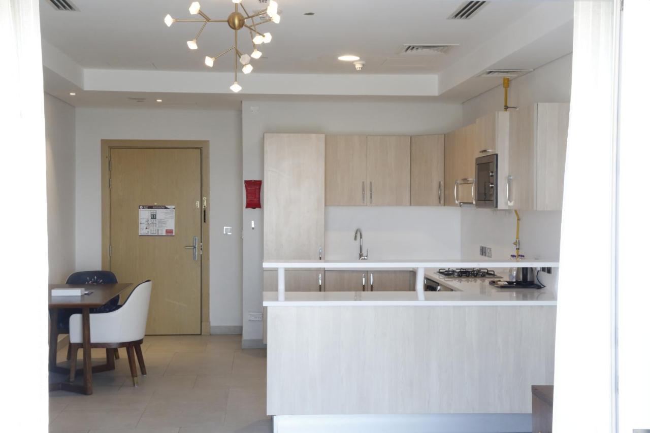Waterfront Hotel Apartment Lusail Eksteriør bilde A kitchen in a typical apartment